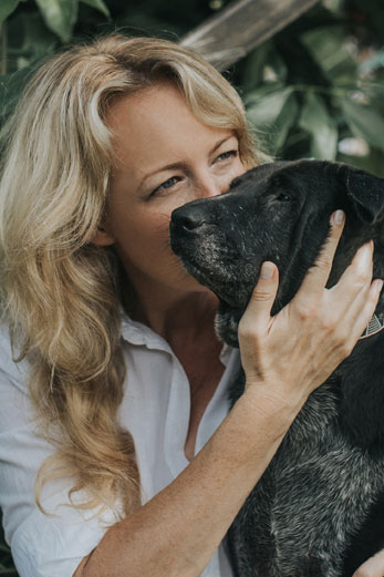 Prue Barber and her rescued Bali Dog