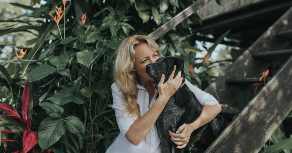 Prue Barber and her rescued Bali Dog