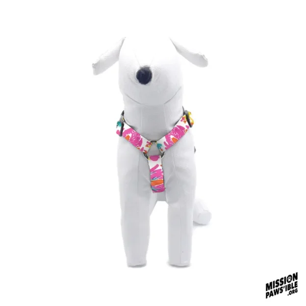 A stuffed white dog wearing the Mermaids Garden Adjustable Harness with a colorful design, featuring a logo in the corner that reads "Mission Pawsible.