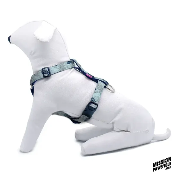 White mannequin dog fitted with the Pineapple Express Blue Adjustable Harness set against a white background, featuring the "Mission Paws'ible" logo in the corner.