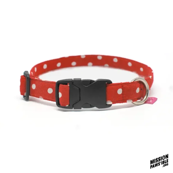 Polka Face Red Collar featuring a red polka dot design, complete with a black plastic buckle and metal ring, shown against a white backdrop.