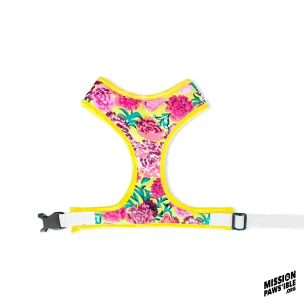 Flower Power Yellow Chest Harness with a bright floral pattern, yellow trim, and an adjustable white strap showcasing pink flowers on a yellow background.