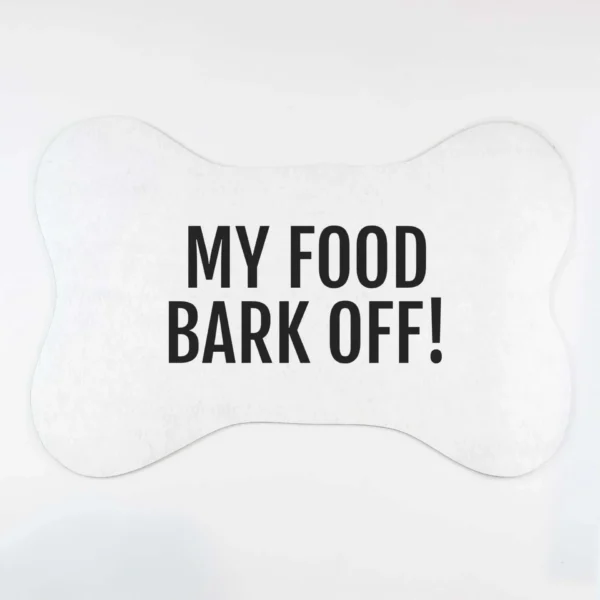 'Bark Off' Bone Shape Pet Mat featuring a white bone-shaped design with the bold black text "MY FOOD BARK OFF!" printed on it.